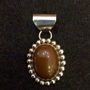 Native American made sterling silver and obsidian pendant